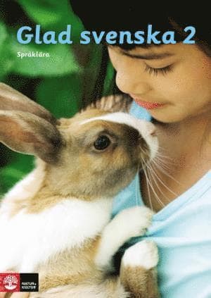 Omslag till boken Glad svenska 2 Språklära Rev2 av Lilian Falkenland